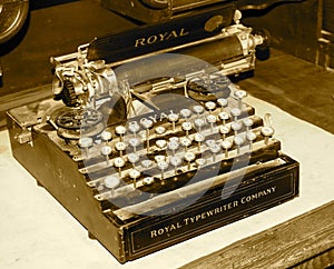 Antique Typewriter On Desk In Sepia Tone