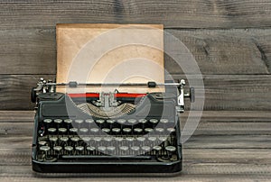 antique typewriter with grungy textured paper page. vintage style still life