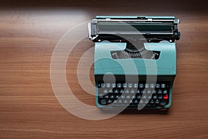 Antique Typewriter. Vintage Typewriter Machine, wood background