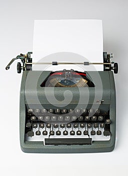 Antique Typewriter on White Background with Paper in Perspective