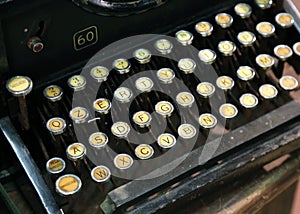 Antique typewriter with white keys