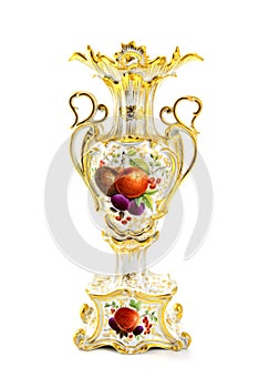 Antique vase with fruits made of porcelain in biedermeier times.