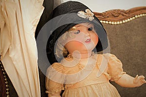 An Antique Victorian Doll with a Hat