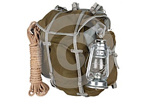 Antique vintage backpack with rope and gas lantern