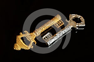 Antique vintage keys on a black background