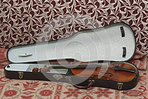 Antique violin in a case