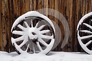 Antique Wagon Wheels in Snow