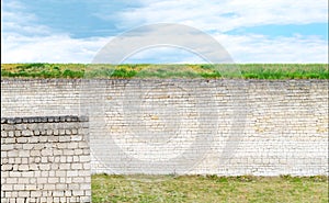 Antique wall made of natural stone. Ancient culture