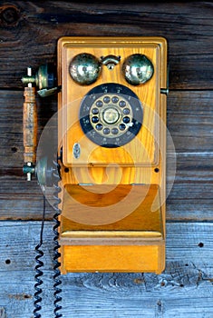 Antique wall phone at museum background