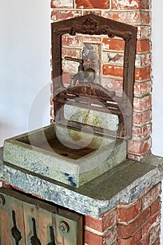 Antique washstand with bronze faucet