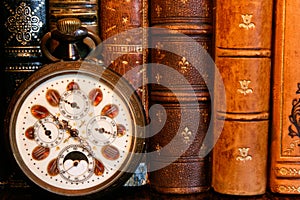 Antique watch with antique books