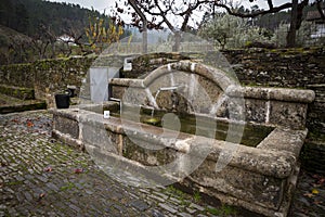 Antique water fountain in Barroca Schist Village photo