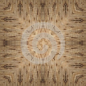 Antique weathered yellow brown pine wood wall panel with abstract centered symmetrical grain pattern