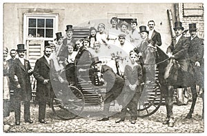 Antique wedding photo with people in vintage clothing