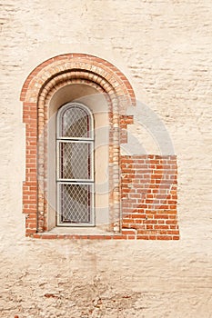 The antique window in stone wall