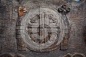 Antique wood carving art at ancient temple door