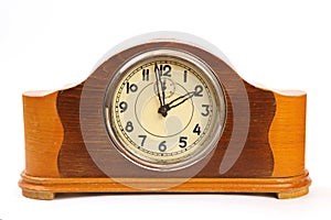 Antique wooden clock on white background