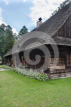 An antique wooden cottage with a log construction without remnants from 1831.