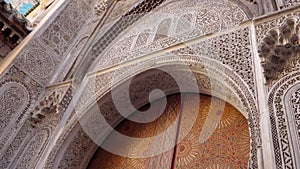 Antique wooden door In Medina of Fes, Morocco. Wood carving door.