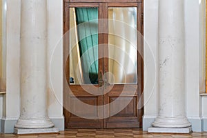 Antique wooden doors with a lock in the Elagin Palace