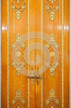 Antique wooden doors with a lock in the Elagin Palace