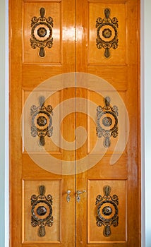 Antique wooden doors with a lock in the Elagin Palace