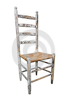 Antique wooden high-back chair isolated.