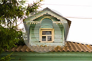 Antique wooden house in Old Town city. wooden house with beautiful carved platbands
