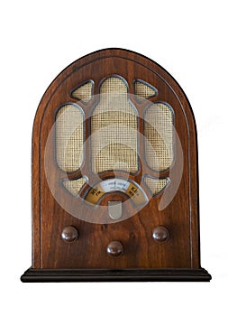 Antique wooden radio isolated on white background. Vintage object that recalls the technology of past years