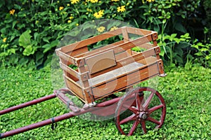 Antique Wooden Trolley with Red Wheels