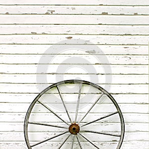 Antique Wooden Wagon Wheel on Rustic White Background