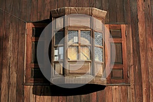 Antique wooden wall and overlapped window