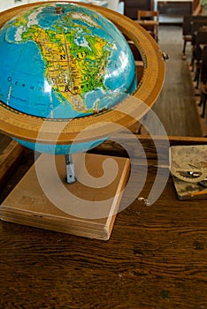 An Antique World Globe on a Desk