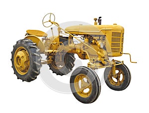 Antique yellow tractor isolated.