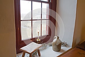 Antiques on old windowsill photo