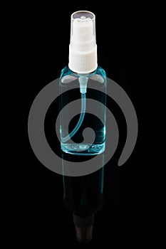 antiseptic on a black background, sanitizer in medicine protection against viruses and bacteria. small and comfortable