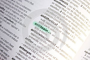 Antitoxin word or phrase in a dictionary photo