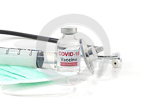 Antiviral vaccine covid-19 bottle and medical Syringe on white background