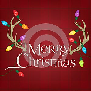 Antlers on a red plaid background with Christmas lights