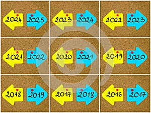 Antonym concepts of new year versus old year written on opposite arrows