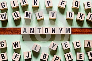 Antonym word concept on cubes