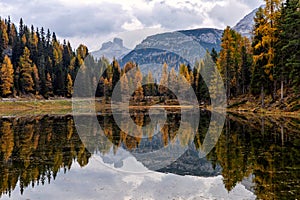 Antorno lake with famous Dolomites mountain peak of Tre Cime di