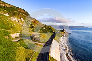 Antrim Coast Road in Northern Ireland, UK, at sunrise