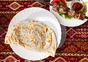 Antyk - thin fried meat pie is a national Tatar dish