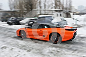 Anuary 3, 2013; Kiev, Ukraine. Jaguar XJ220. Vehicle in motion. Winter. Cold