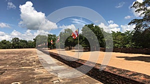 Anuradhapura, Sri Lanka, kind of on the fence with the flags near the Dagoba