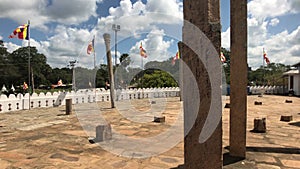 Anuradhapura, Sri Lanka, view of the site with flags and pillars