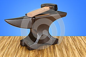 Anvil and hammer on the wooden table. 3D rendering