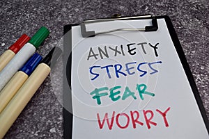 Anxiety, Stress, Fear, Worry write on sticky notes isolated on Office Desk