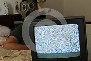 Anxious man watching tv static